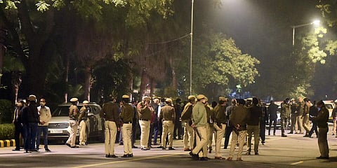Security personnel inspect the area after a low intensity blast outside the Israeli Embassy, in New Delhi. (File Photo | Parveen Negi, EPS)