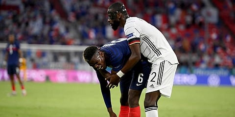 Antonio Ruediger (R) stands beside Paul Pogba during the Euro 2020 soccer championship group F match between France and Germany at the Allianz Arena stadium in Munich. (Photo | AP)