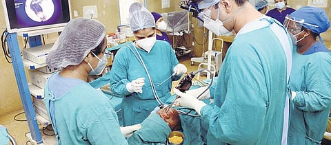 Doctors treat a patient infected with black fungus. (File Photo | PTI)