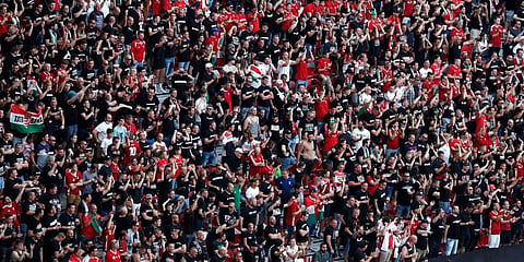 Hungarian fans wait for the start of the Euro 2020 soccer championship group F match between Hungary and Portugal at the Ferenc Puskas stadium in Budapest. (Photo | AP)
