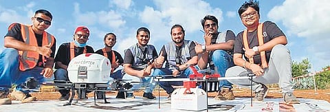 Representatives of Throttle Aerospace Systems with their medical  drones in Gowribidanur on Tuesday | Express