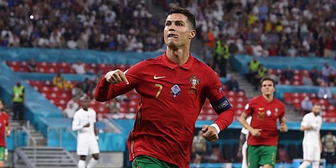 Cristiano Ronaldo celebrates after scoring his side's second goal during the Euro 2020 championship group F match between Portugal and France at the Puskas Arena in Budapest. (Photo | AP)