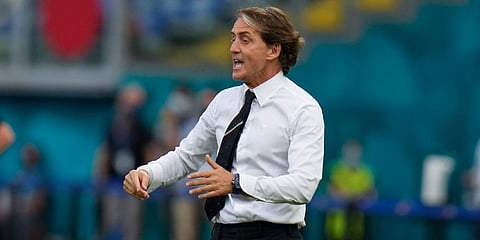 Italy manager Roberto Mancini talks to his players during the Euro 2020 soccer championship group A match between Italy and Wales, at the Rome Olympic Stadium. (Photo | AP)