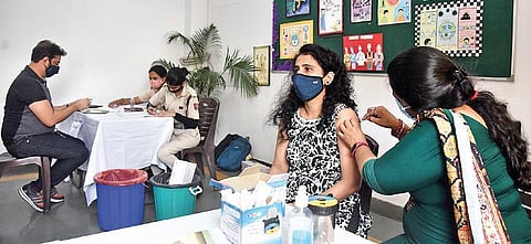 A beneficiary  gets vaccine against Covid-19 in New Delhi. (Photo | Parveen Negi, EPS)
