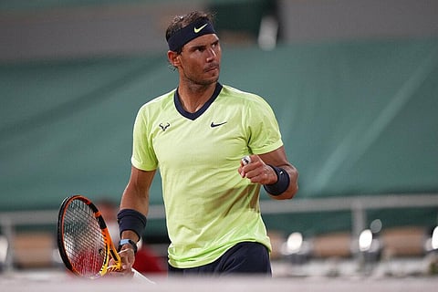 Spain's Rafael Nadal celebrates after winning a point against Richard Gasquet of France during their second round match on day 5, of the French Open tennis tournament. (Photo | AP)