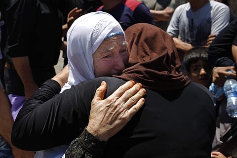 Syrian refugees prepare to cross into Syria by bus at the Lebanese border crossing point of Masnaa, in Bekaa Valley, Lebanon. Image used for representational purposes (Photo | AP)