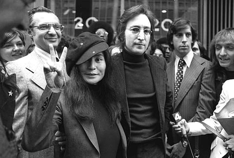 Beatles legend and one of the most famous songwriters John Lennon and his wife, Yoko Ono, leave a U.S. Immigration hearing in New York City. ( Photo | AP)