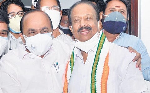 Opposition leader V D Satheesan congratulating new Congress state president K Sudhakaran at the latter's residence in Pettah,T'Puram, on Tuesday | B P Deepu
