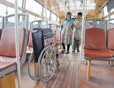 A file photo of disabled persons inspecting a prototype of an ‘accessible’ bus at a public consultation organised by the Transport Department in 2019 | Express