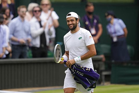 Italy's Matteo Berrettini celebrates after defeating Poland's Hubert Hurkacz during the men's singles semifinals match on day eleven of the Wimbledon. (Photo | AP)