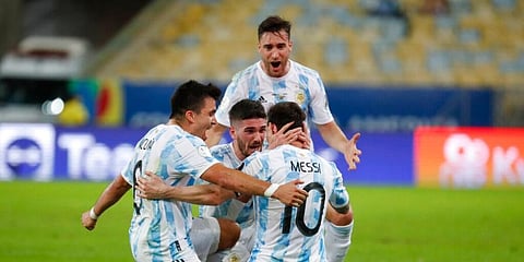 Argentina's Lionel Messi celebrates with teammates beating Brazil 1-0 in the Copa America final soccer match at the Maracana stadium in Rio de Janeiro, Brazil, Saturday, July 10, 2021. (Photo | AP)
