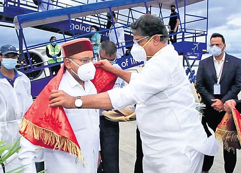 Revenue Minister R Ashoka receives Governor-designate Thawar Chand Gehlot at Kempegowda International Airport in Bengaluru on Saturday | Express