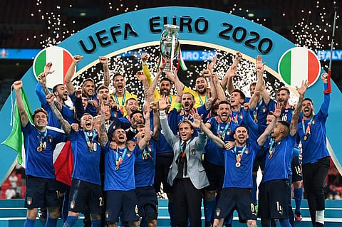 Italy captain Chiellini raises the European Championship trophy after winning EURO 2020 final against England at Wembley Stadium in London on July 11, 2021. (Photo | AFP)