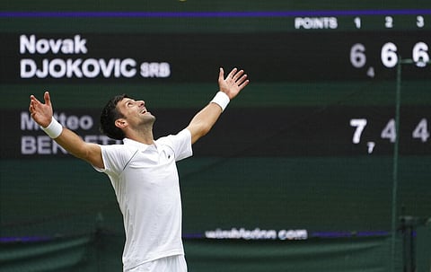 Serbia's Novak Djokovic celebrates his victory over Italy's Matteo Berrettini in the men's singles final match on day thirteen of the Wimbledon. (Photo | AP)