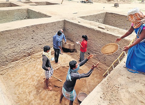 The authorities were studying the explored earthenware at a trench in Keezhadi on Monday  | kk sundar