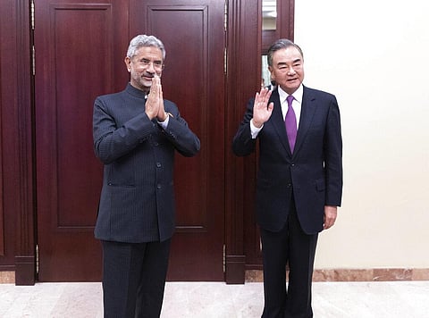 FILE | India's External Affairs Minister Subrahmanyam Jaishankar, left, and Chinese Foreign Minister Wang Yi pose for a photo. (Photo | AP)