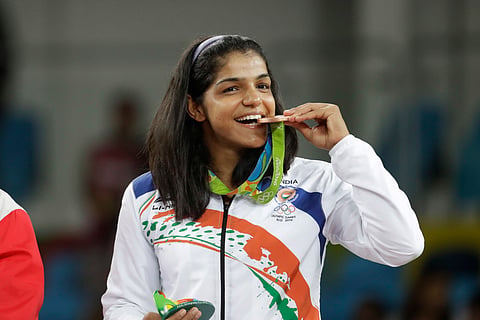 FILE | India's Sakshi Malik poses with her bronze medal at the 2016 Summer Olympics in Rio de Janeiro. (Photo  | AP)