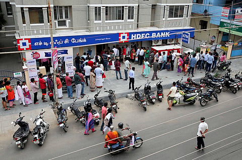 Customers waiting before an HDFC Bank branch in Chennai (File Photo | EPS)