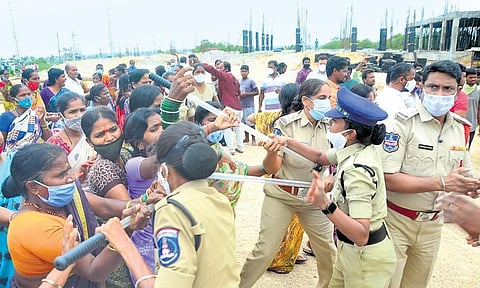 Police detain Congress workers who tried to stage a protest near the auctioned Kokapet lands on Monday.