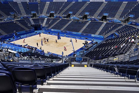 Empty stands at Shiokaze Park during a men's beach volleyball match between Brazil and Chile at the 2020 Summer Olympics. (Photo | AP)
