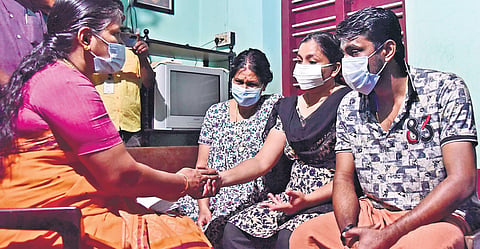 BJP leader Sobha Surendran consoles the family of Mukundan who ended his life after Karuvannur Cooperative Bank served a revenue recovery notice demanding to pay H80 lakh as loan arrears | Pics: Albin