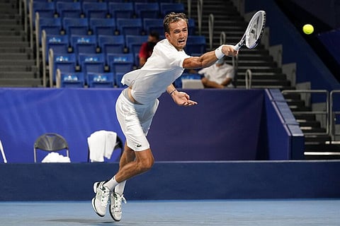 Daniil Medvedev, of the Russian Olympic Committee, returns to Pablo Carreno Busta, of Spain. (Photo | AP)