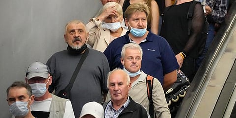 People ride the escalator in the subway amid the ongoing COVID-19 pandemic in St. Petersburg, Russia. (File Photo | AP)