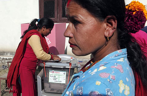 FILE | A Nepalese woman casts vote during the legislative elections in Nepal on Nov. 26, 2017. (AP Photo)
