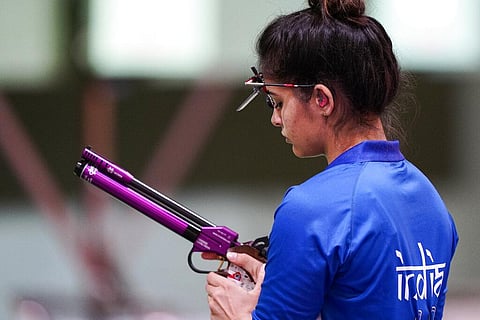 Manu Bhaker, of India, competes in the women's shooting event in the 2020 Summer Olympics. (Photo | AP)