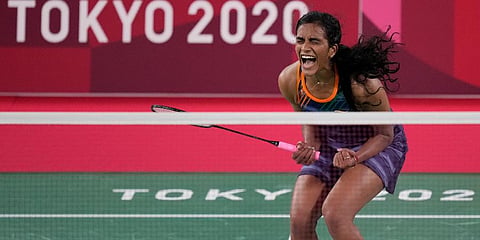 India's PV Sindhu celebrates after wining against Japan's Akane Yamaguchi during their women's singles badminton quarterfinal match at the 2020 Summer Olympics in Tokyo, Japan. (Photo | AP)