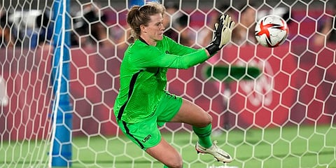 US' goalkeeper Alyssa Naeher stops a ball in a the penalty shootout against Netherlands during a women's quarterfinal match at the 2020 Summer Olympics in Yokohama, Japan. (Photo | AP)