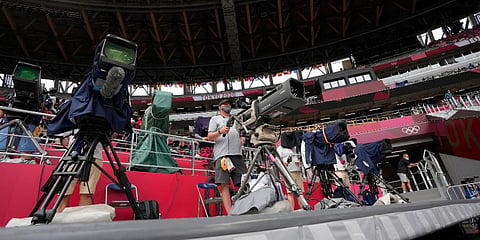 Cameramen work at the 2020 Summer Olympics in Tokyo. (Photo | AP) 