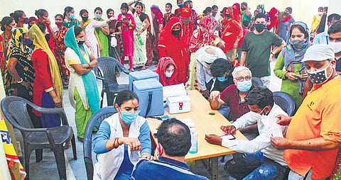 A beneficiary being administered Covid-19 vaccine in Gurugram on Sunday | pti