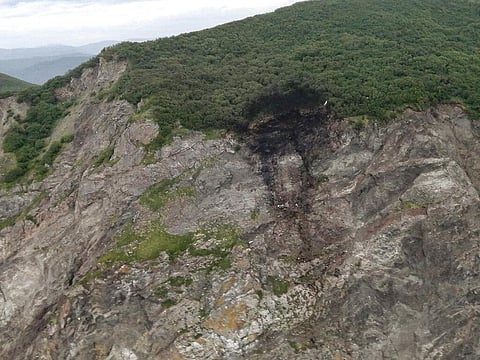 This photo released by the Russia Emergency Situations Ministry press service on Wednesday, July 7, 2021, shows wreckage of a missing Antonov An-26 missing plane. (Photo | AP)