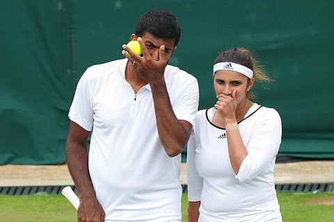 India's Sania Mirza, right, and Rohan Bopanna encourage each other during the mixed doubles third round match on day nine of the Wimbledon Tennis Championships (Photo | AP)