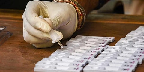Bhargav Ram produced a Covid +ve certificate issued in the name of a private lab in the city, in the court. (Representational image| PTI)