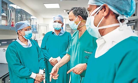 Chief Minister Arvind Kejriwal (L) with Health Minister Satyendar Jain (2L) during inauguration of a new genome sequencing facility at ILBS. (Photo | PTI)