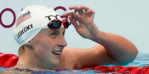 Katie Ledecky, of the United States, reacts after winning a heat of the women's 800-meter freestyle at the 2020 Summer Olympics in Tokyo, Japan. (Photo | AP)
