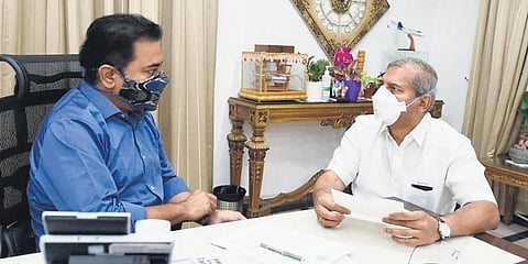 MLA Ch Ramesh Babu with MAUD Minister KT Rama Rao during a meeting  on Vemulawada development works in Hyderabad on Tuesday, August 10, 2021. (Photo | Express)