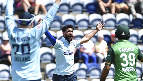 Saqib Mahmood, center, has been added to the England squad for the test series against India (File Photo | AP)