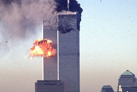 A hijacked commercial plane crashing into the World Trade Center in New York. (File photo| AFP)