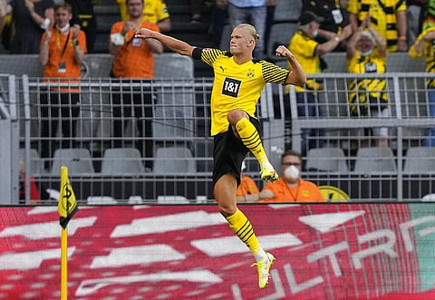 Dortmund's Erling Haaland celebrates after scoring his side's goal during Bundesliga match against Eintracht Frankfurt in Dortmund, Germany, Aug. 14, 2021. (Photo | AP)