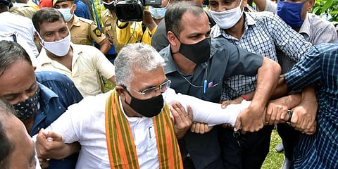 Kolkata Police arrested BJP MP Dilip Ghosh during the protest against the State Government near Gandhi Statue, in Kolkata on Monday. (Photo | ANI)