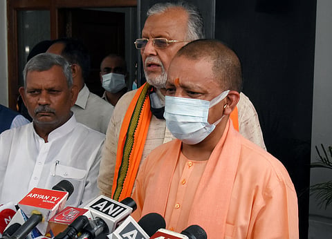 UP Chief Minister Yogi Adityanath addresses a press conference as he arrives to attend the first day of the Monsoon session of the state Assembly, in Lucknow. (Photo | ANI)
