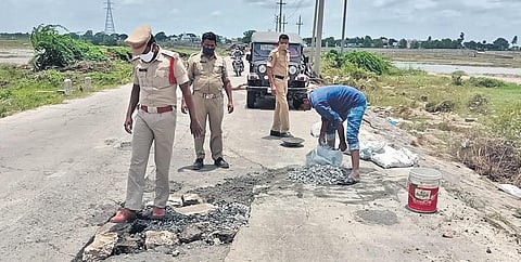 Extending support to reduce road accidents, Vatsavai police repaired the damaged portion of Munneru Bridge on Sunday | Express