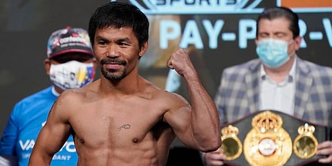 Manny Pacquiao, of the Philippines, poses for photographers during a weigh-in Friday, August 20, 2021, in Las Vegas. (Photo | AP)