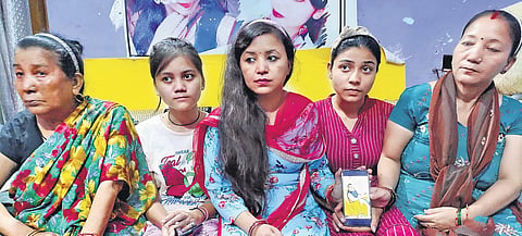 Family members of Jeet Bahadur Singh, a youth stranded in Afghanistan, at their home in UP’s Shajahanpur | PTI