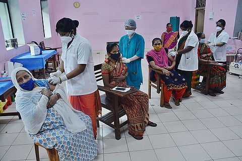 Health workers administer Covid vaccine to women during a special drive in  Thane, Maharashtra. (Photo | PTI)