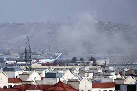 FILE | Smoke rises from a deadly explosion outside the airport in Kabul, Afghanistan. (Photo | AP)