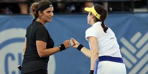 Sania Mirza (L) and Christina McHale celebrate a point during the Tennis in the Land doubles championship against Shuko Aoyama and Ena Shibahara in Cleveland. (Photo | AP)